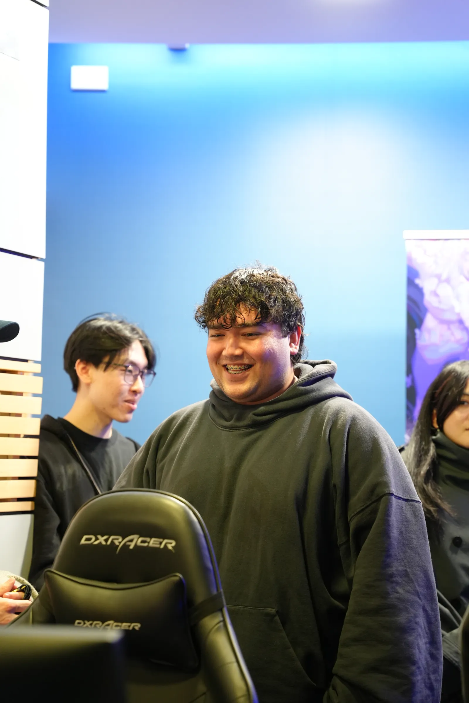 Members laughing together at the welcome party